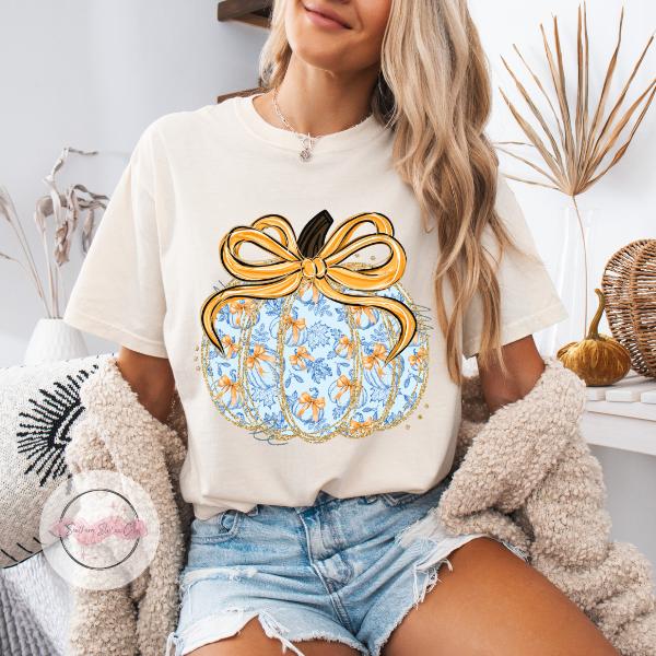 Blue Fall Pumpkin Tshirt with Gold Bow Design for Autumn Fashion